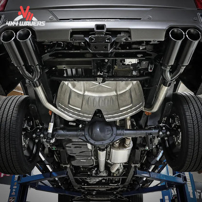 Rear underbody view of installed quad tip stainless exhaust on Chevy Silverado SKU 49-34102-P