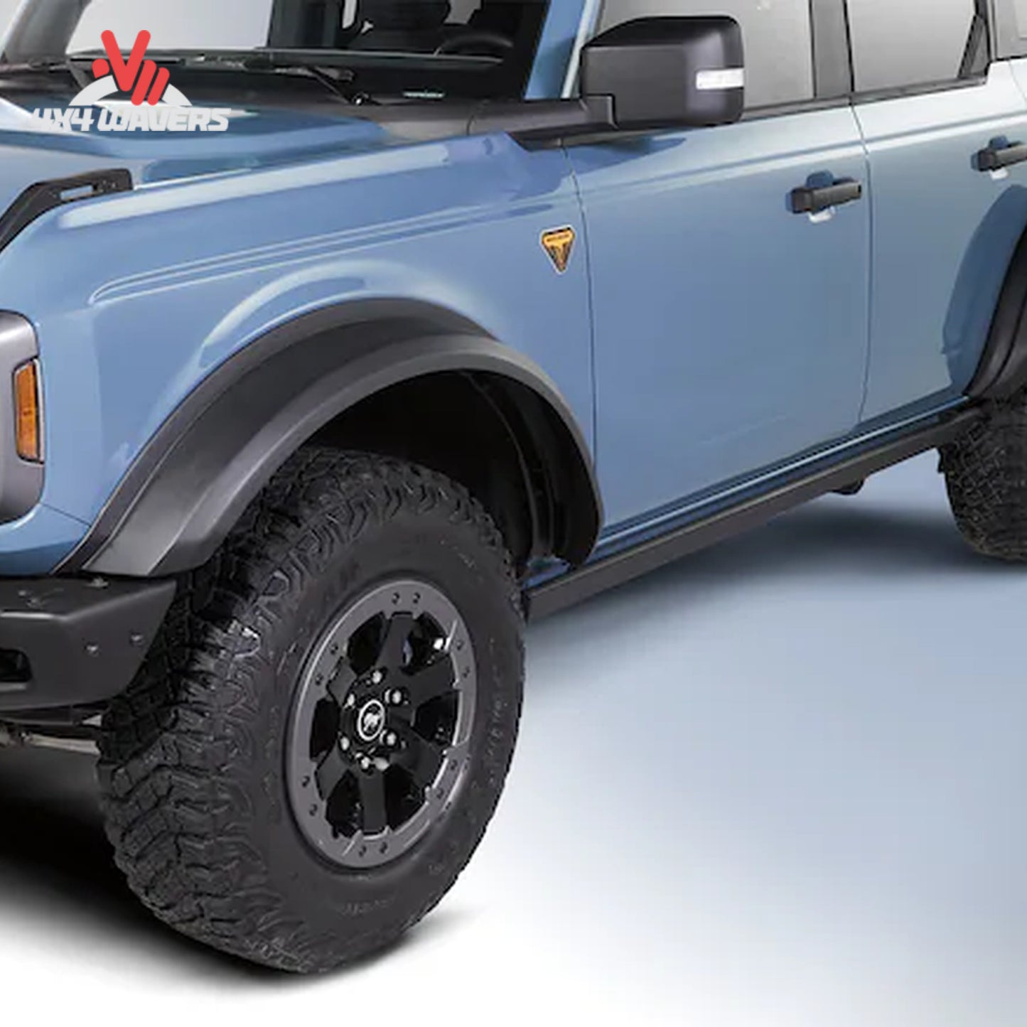 Air Design satin black wide-body fender flare kit installed on a Ford Bronco 4-door with oversized off-road tires
