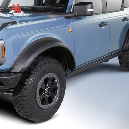 Air Design satin black wide-body fender flare kit installed on a Ford Bronco 4-door with oversized off-road tires
