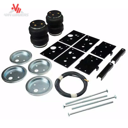 A complete LoadLifter 5000 air spring suspension kit including 2-ply rubber bellows, mounting brackets, and air lines for an F-150 PowerBoost SKU BBCG_57389.