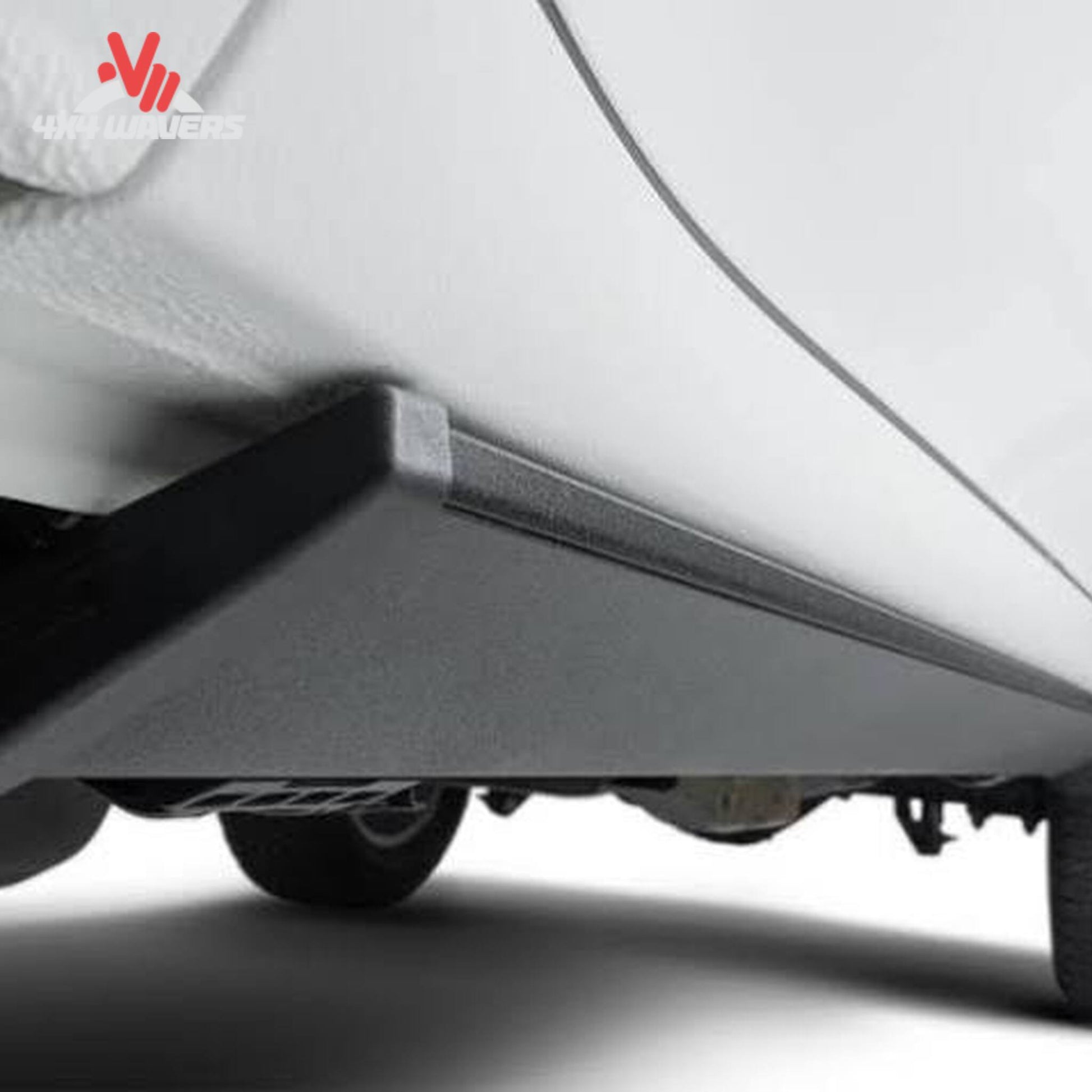 Retracted power step tucked beneath body panel on Chevy Silverado HD SKU 76255-01A