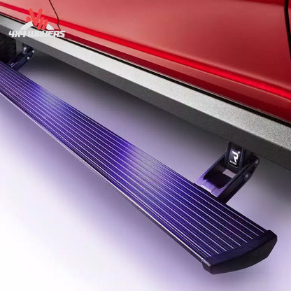 Deployed AMP PowerStep XL running board on lifted Chevy Silverado 2500HD SKU 77154-01A