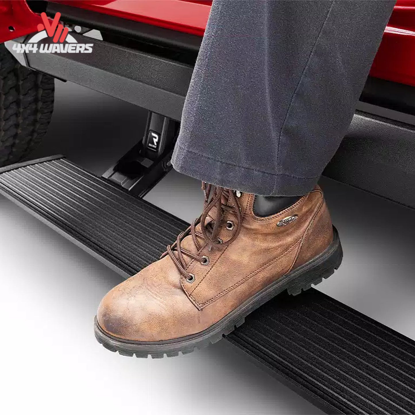 Deployed AMP PowerStep XL running board on lifted Chevy Silverado 2500HD SKU 77154-01A