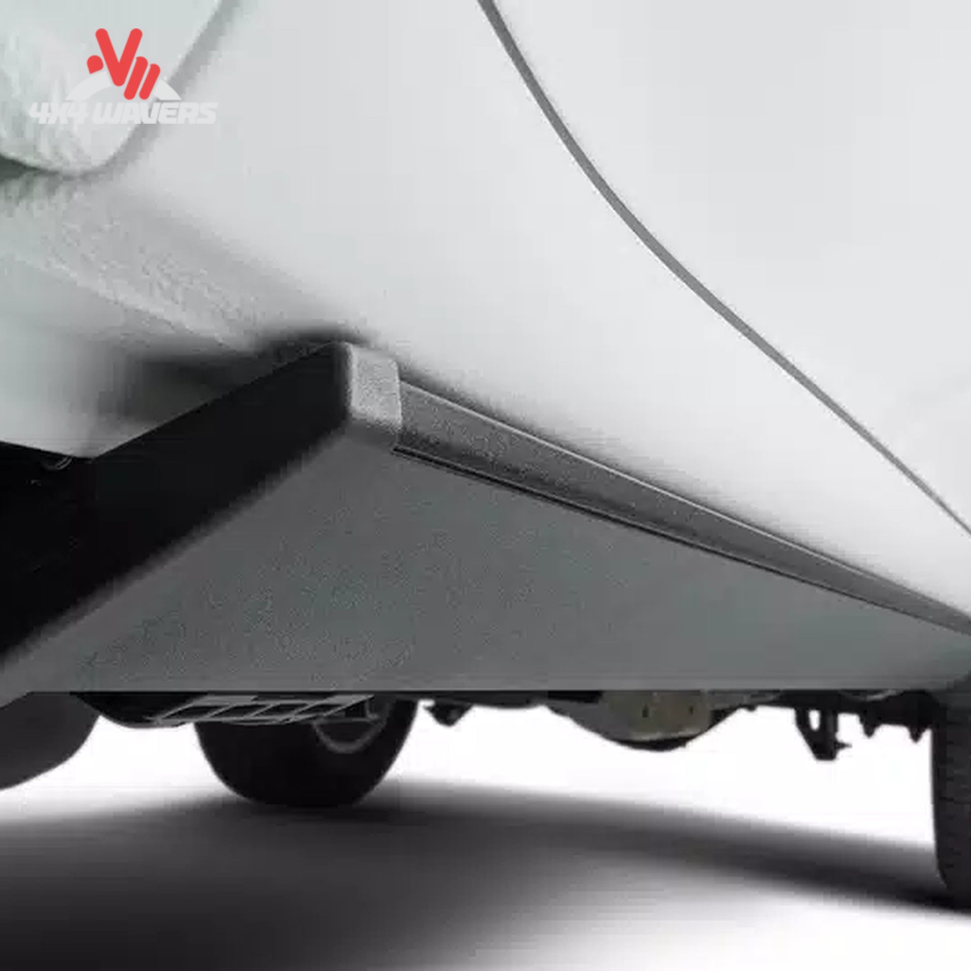 Hidden running board system tucked beneath vehicle body for off-road clearance