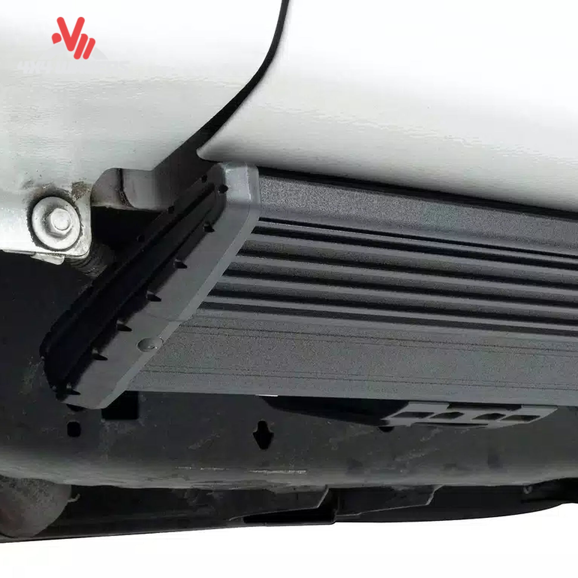 Close-up detail showing the dual-motor electric step retracted flush against the rocker panel for ground clearance SKU BGQD_78152-01A.