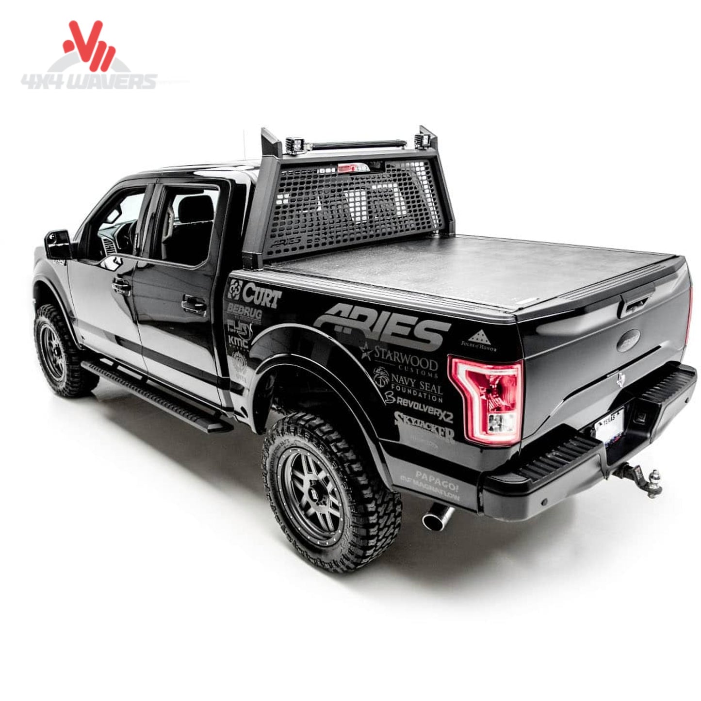 Rear perspective view of a Ford F-150 truck fitted with an ARIES AdvantEDGE black aluminum cab protector rack SKU BBDR_1110102.