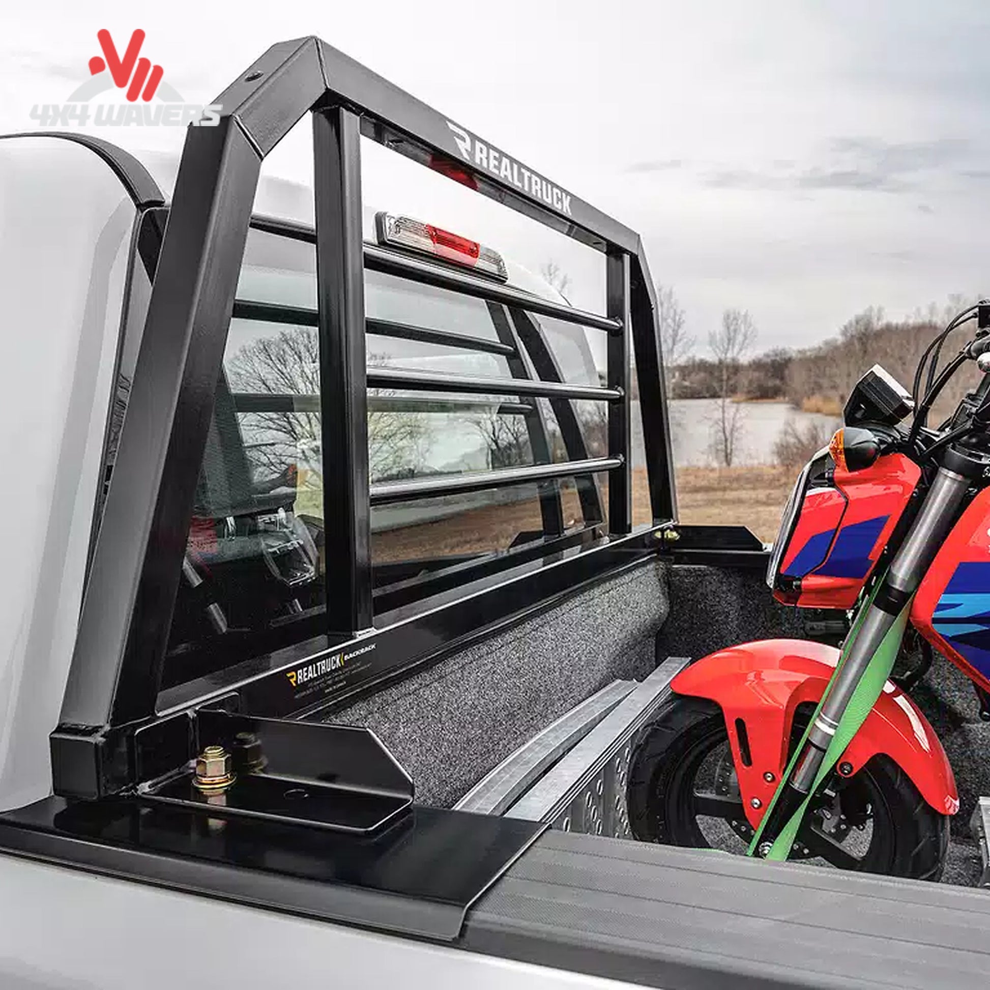 RealTruck Backrack SRX900 Headache Rack installed on pickup truck bed, providing cab protection and added cargo security.