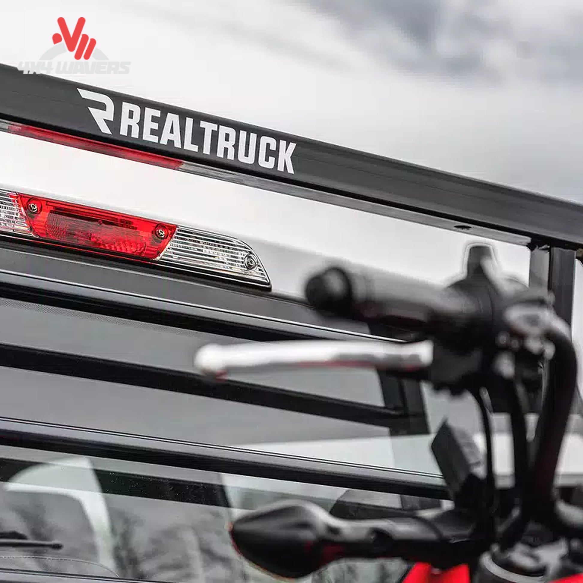 RealTruck Backrack SRX900 headache rack installed in pickup truck bed, sturdy frame designed for truck cab protection.