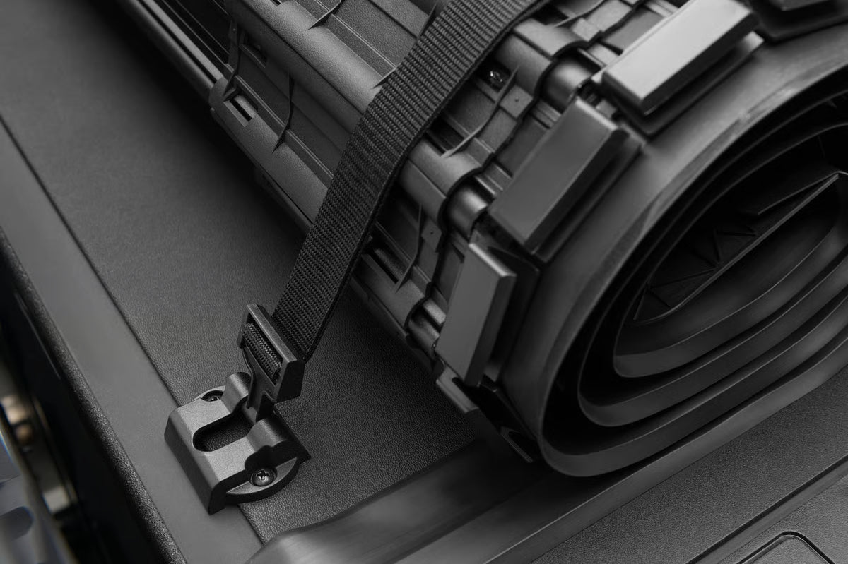 Close-up of BAK Revolver X4s matte black aluminum slats on Jeep Gladiator 5ft bed tonneau cover, showcasing durable roll-up design.
