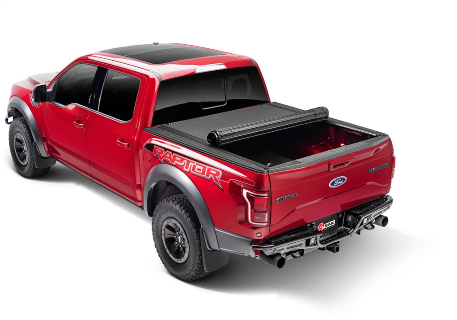 BAK Revolver X4s roll-up tonneau cover open on a Jeep Gladiator 5ft bed, matte black aluminum slats, rugged truck bed cover
