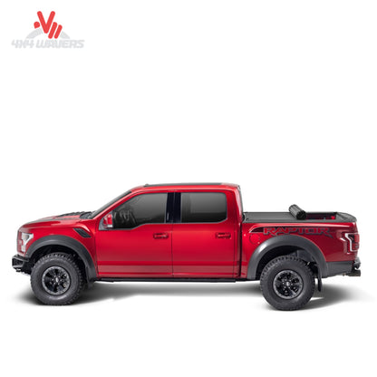 BAK Revolver X4s roll-up tonneau cover on a 15-20 Ford F-150 5.5ft bed, showing sleek black slat design for truck bed protection.