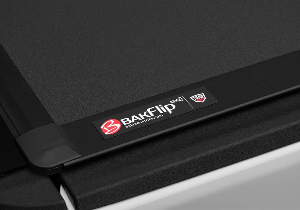 Matte aluminum BAKFlip MX4 hard folding tonneau cover on Jeep Gladiator 5ft bed with tailgate lock system and 400lb capacity