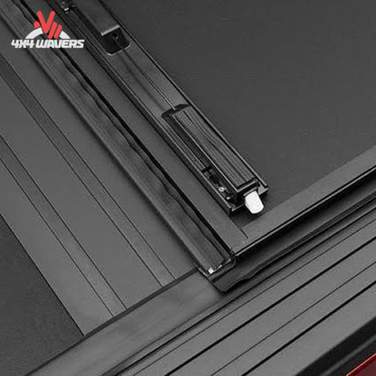 BAKFLIP MX4 hard folding tonneau cover on a 2004-2014 Ford F-150 with a 6.5-foot bed; dual-action tailgate seal visible.