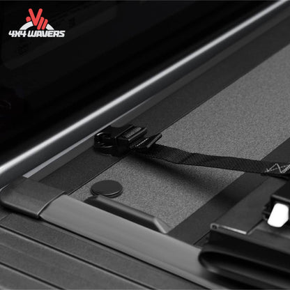BAKFLIP MX4 hard folding tonneau cover on a Ford F-150 Raptor 5.5' bed, showing dual-action tailgate seal for secure truck bed coverage.
