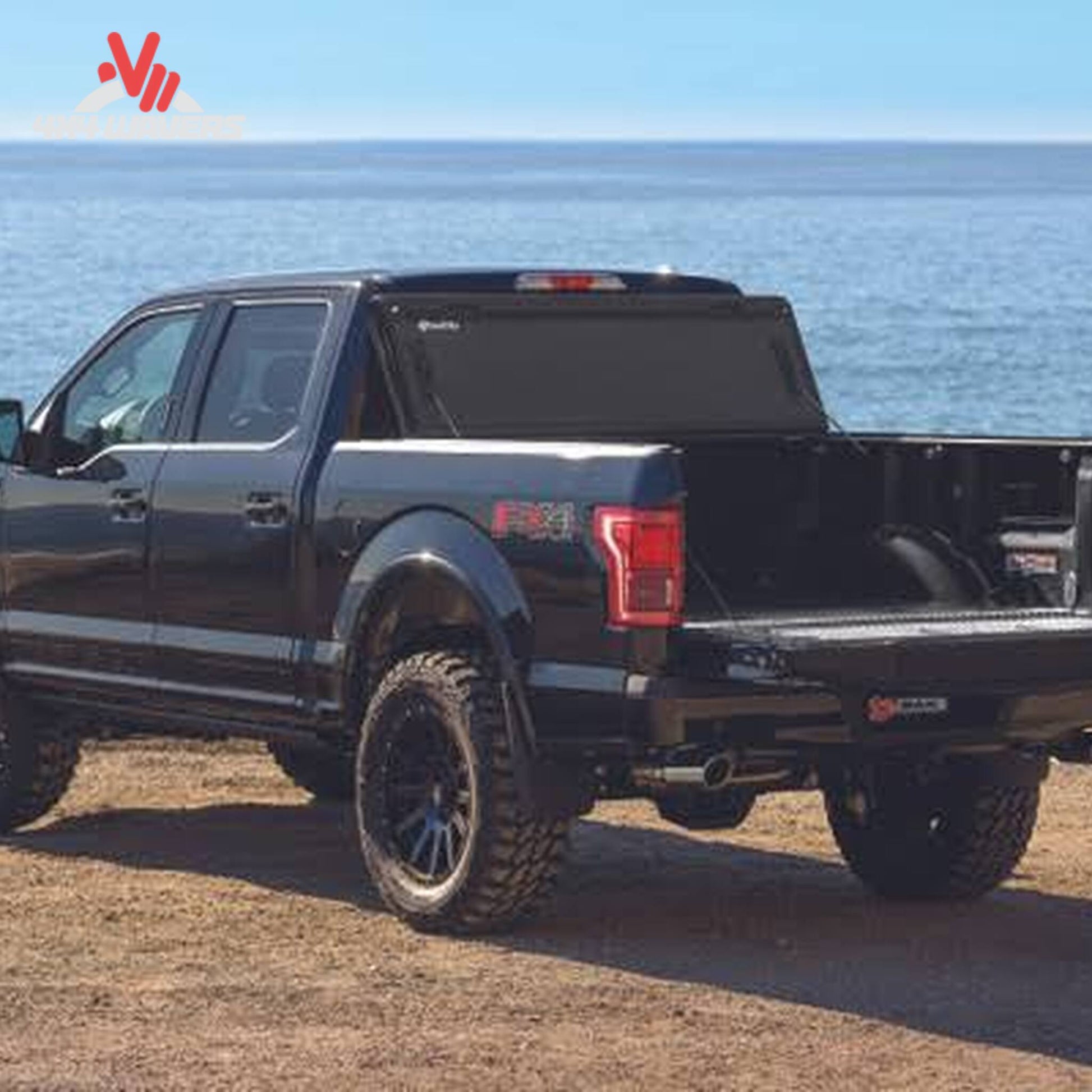 BAKFLIP MX4 hard folding tonneau cover on a 2004-2014 Ford F-150 with 6.5-foot bed, showing full bed access and support rods.