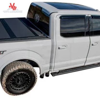 Low-profile rail detail of the BAKFLIP MX4 hard folding tonneau cover on a 2004-2014 Ford F-150 with 6.5-foot bed, by RealTruck BAK.