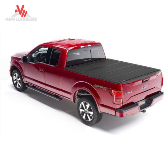 alt
Cubierta rígida plegable BAKFLIP MX4 para una Ford F-150 2004-2014 con caja de 6.5 pies, mostrando su diseño negro duradero.