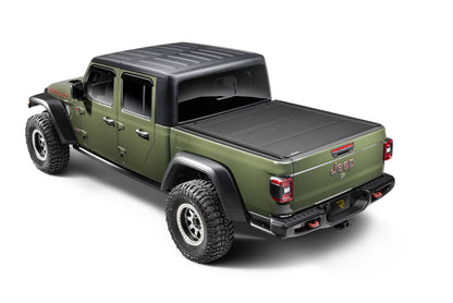 BAKFlip MX4 TS hard folding tonneau cover on Jeep Gladiator 5ft bed, closed, with heavy-duty aluminum construction and T-slot rails.