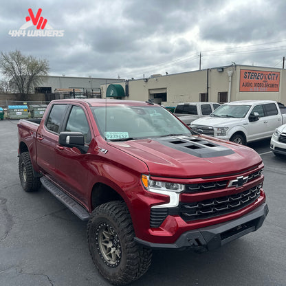 Side profile of lifted GMC Sierra 1500 standing on 35 inch off road tires SKU BDS1800FS