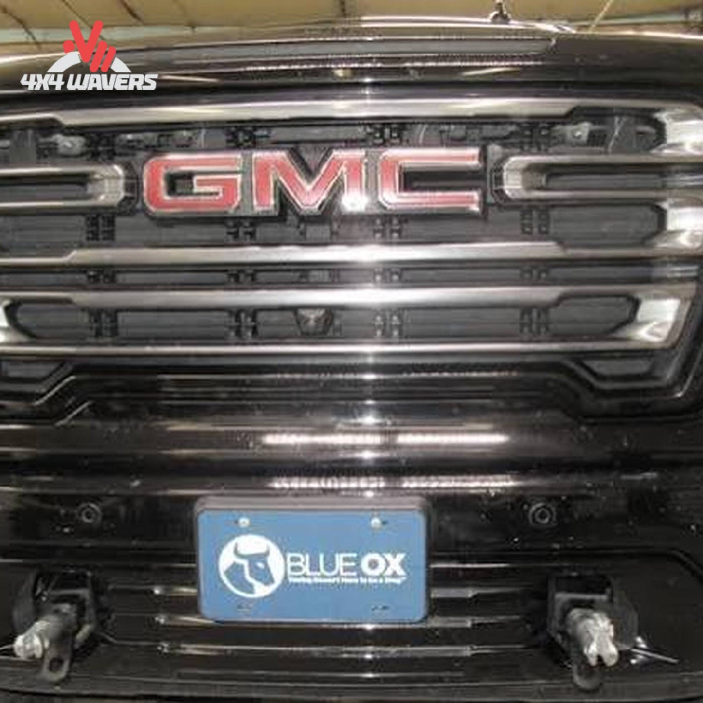 Installed Blue Ox BX1753 baseplate on front bumper of GMC Sierra 1500 SKU BX1753