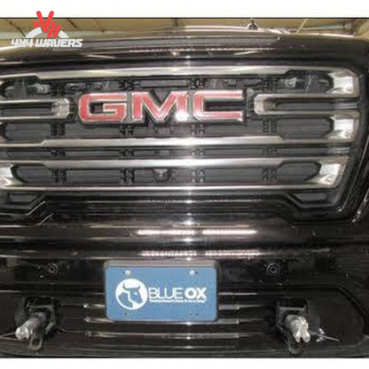 Removable attachment tabs protruding cleanly through front bumper openings on Sierra 1500 SKU BX1753