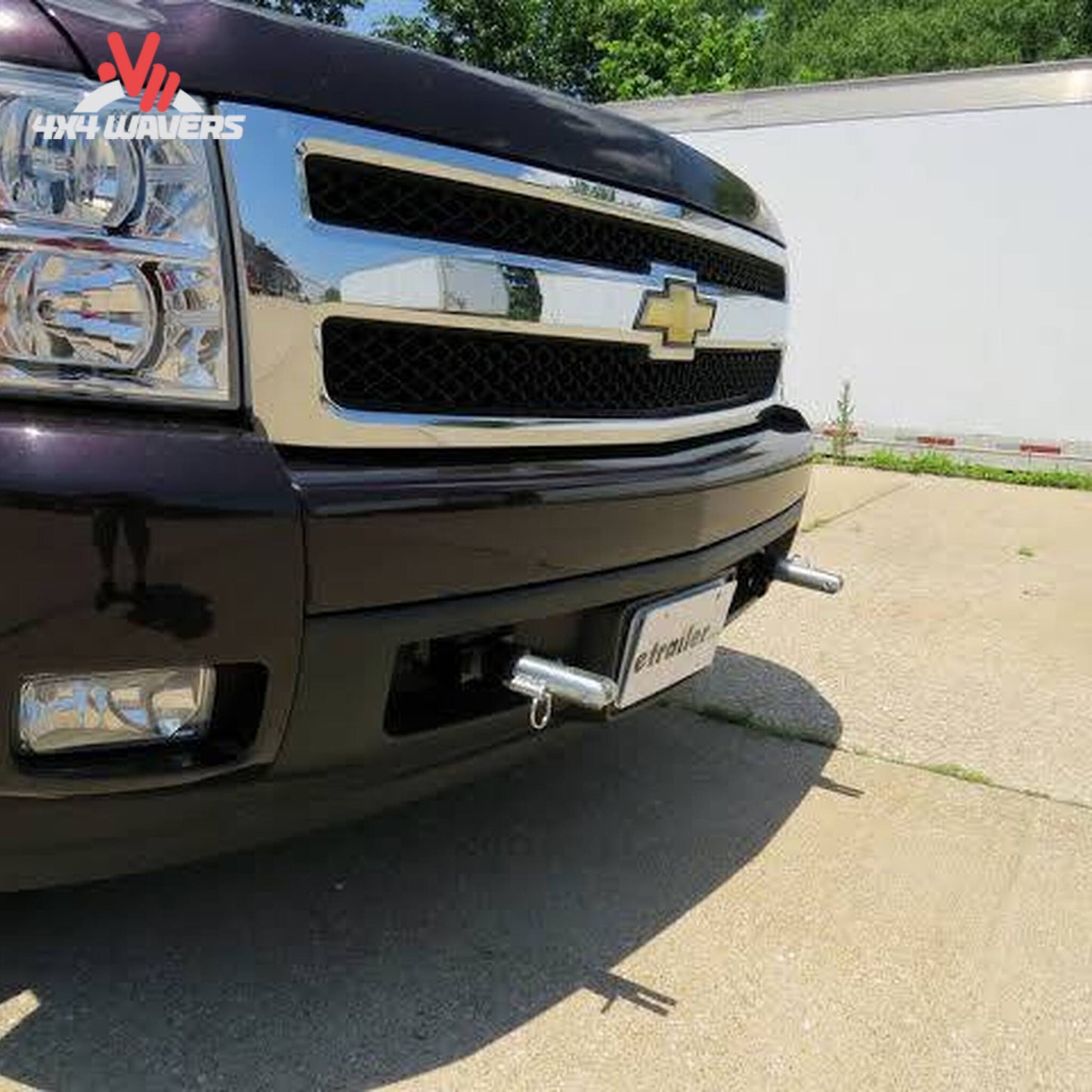 Removable attachment tabs protruding cleanly through front bumper mesh on Silverado 1500 SKU BX1674