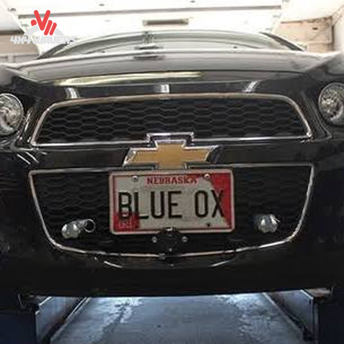 Installed Blue Ox BX1754 baseplate on front bumper of Chevy Silverado 1500 SKU BX1754