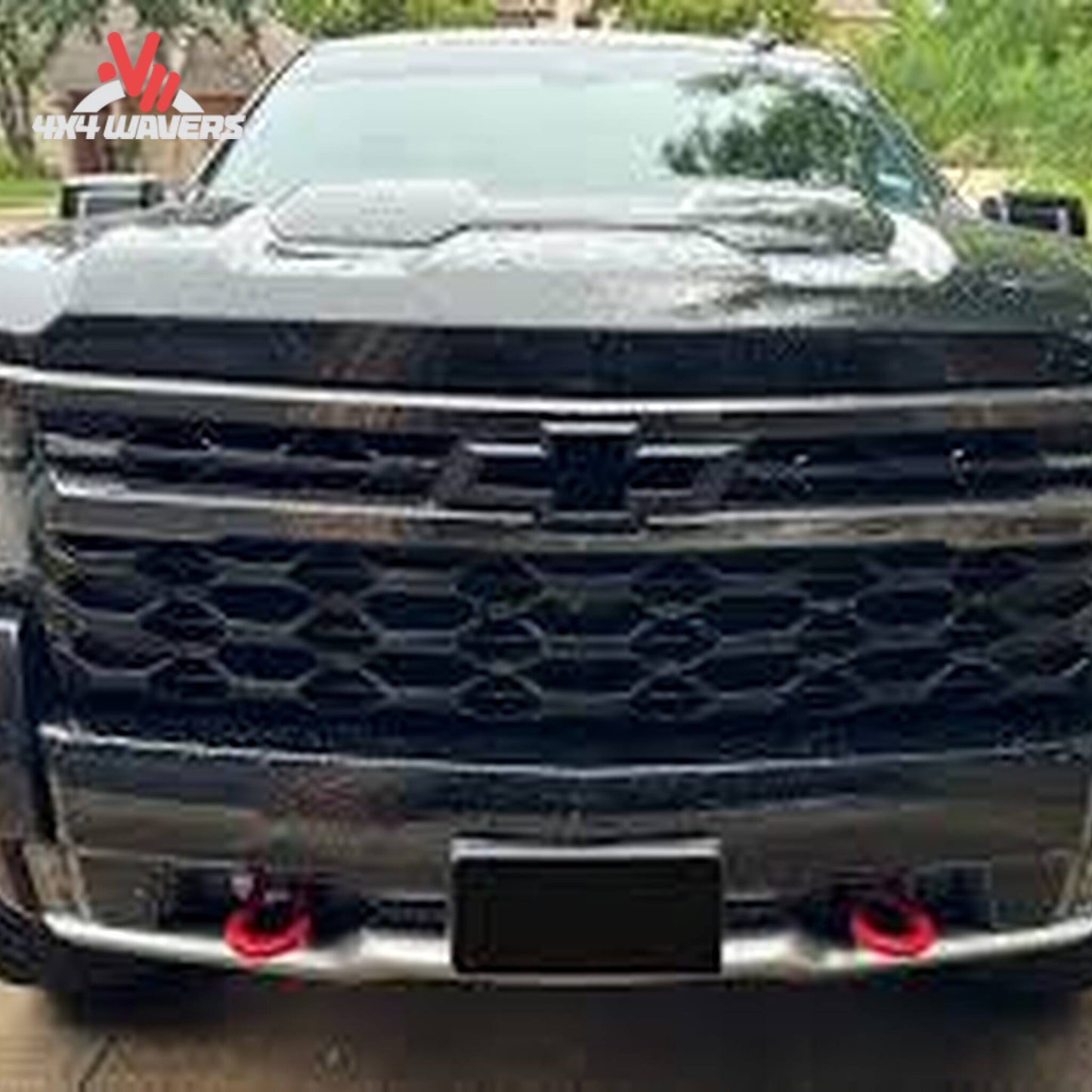 Removable attachment tabs protruding cleanly through front bumper mesh on Silverado ZR2 SKU BX1757