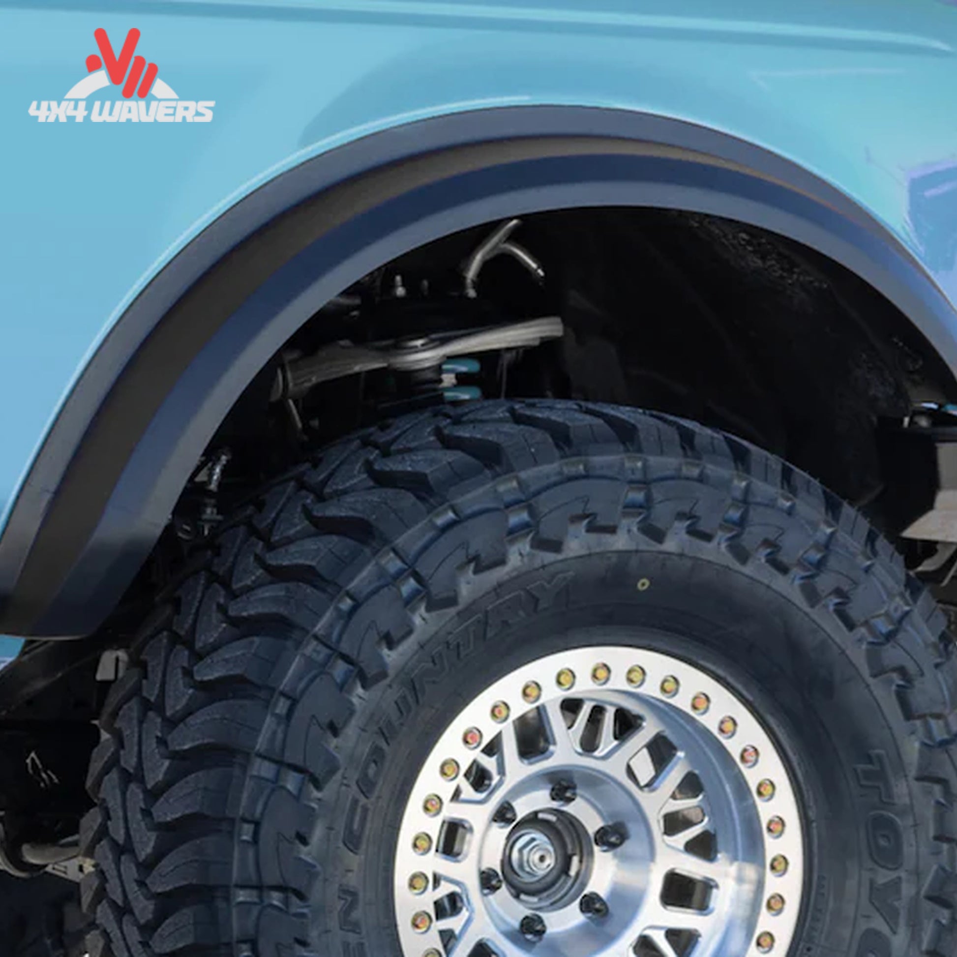Installed rear quarter image highlighting extra tire coverage and off-road styling