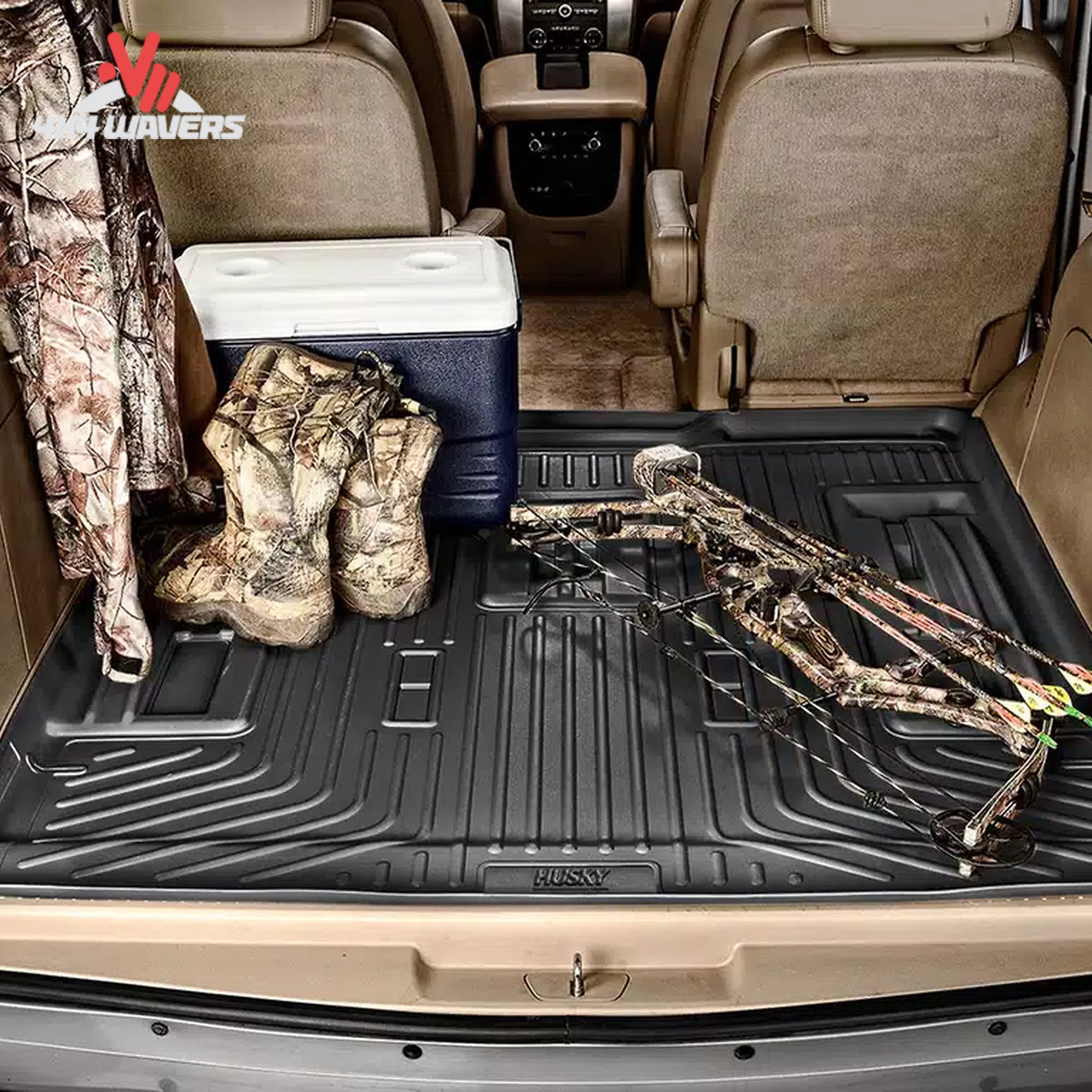 Ford Bronco cargo area carrying camping gear protected by a Husky WeatherBeater liner