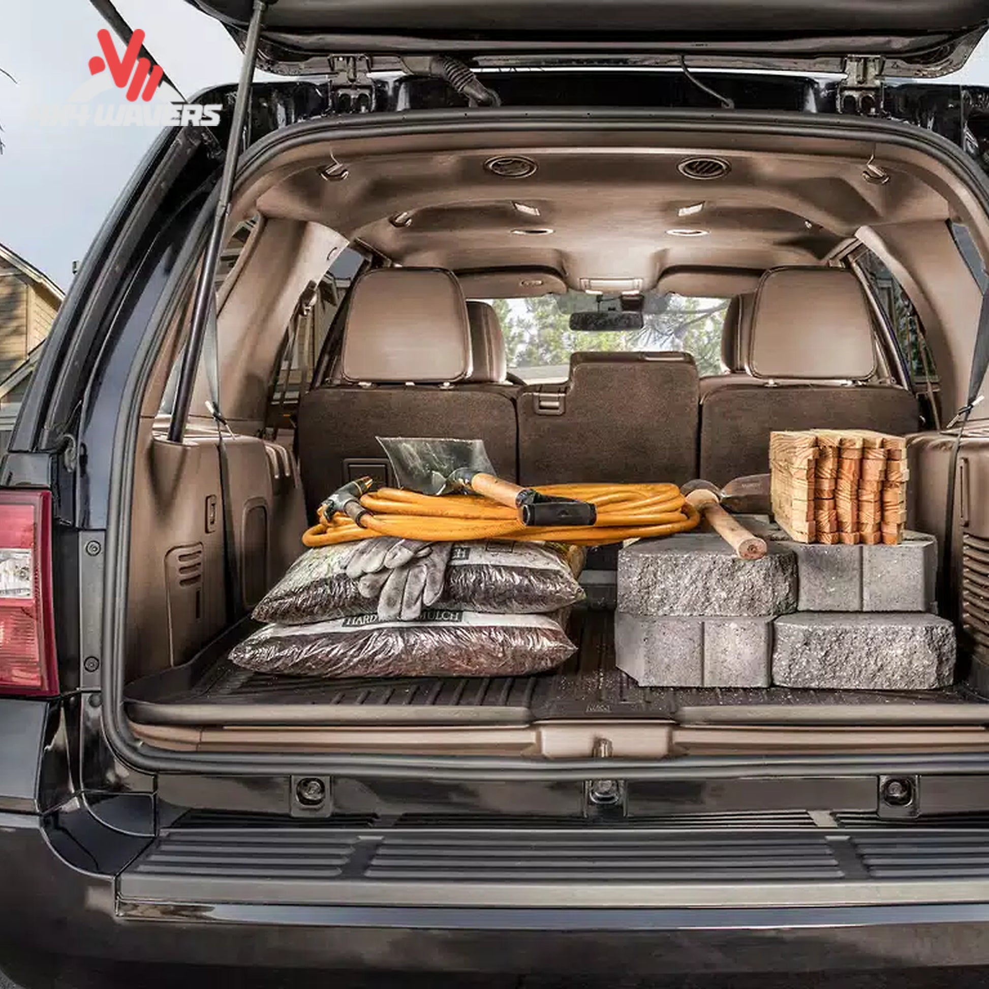 Ford Bronco cargo area carrying camping gear protected by a Husky WeatherBeater liner