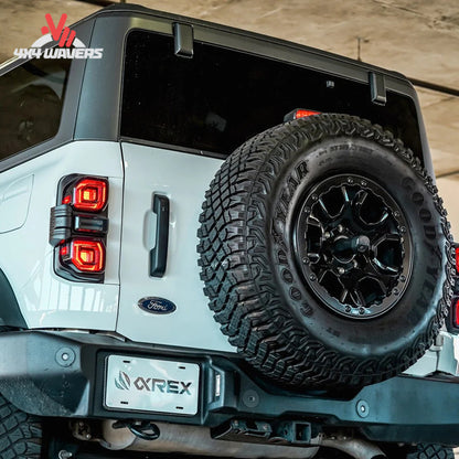 Rear view showing the unique prismatic LED lighting signature on a Ford Bronco