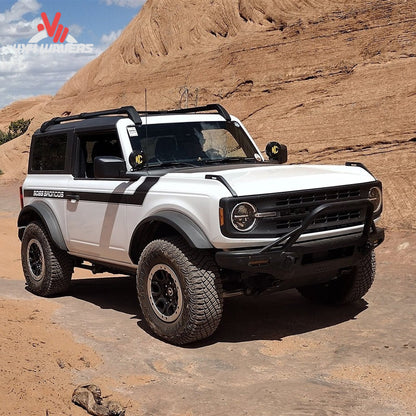 Modified Ford Bronco featuring upgraded front-end armor and off-road protection