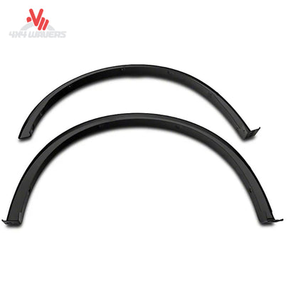 Bushwacker OE Style Fender Flares for Ford F150 2018-2020, durable Dura-Flex ABS material, four-piece set installed on truck wheels.