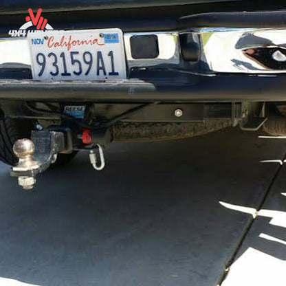 Installed CURT Class 4 receiver hitch under GMC Sierra 1500 rear bumper SKU 14301