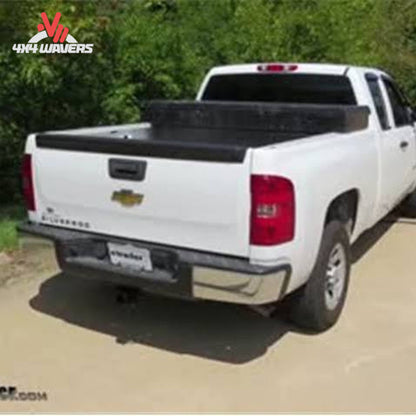 Installed CURT Class 4 receiver hitch under Chevrolet Silverado 1500 rear bumper SKU 14301