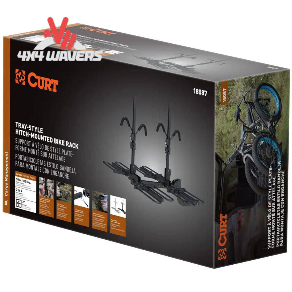 Vista frontal del portabicicletas de enganche CURT tipo bandeja para 4 bicicletas, para receptor de 2 pulgadas, ajuste universal, diseñado para transportar varias bicicletas de forma segura.