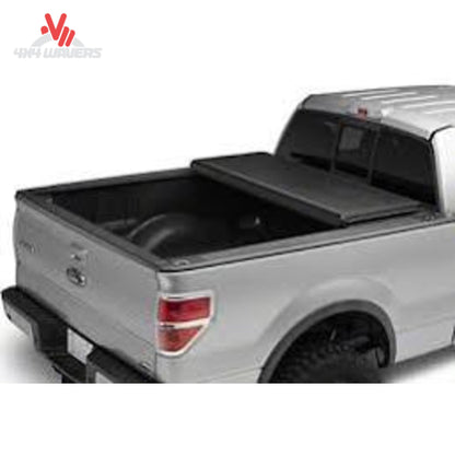 Dura-Flip hard folding tonneau cover on a 2004-2014 Ford F150 with 5.5ft bed, showing its durable, secure design and sleek finish.