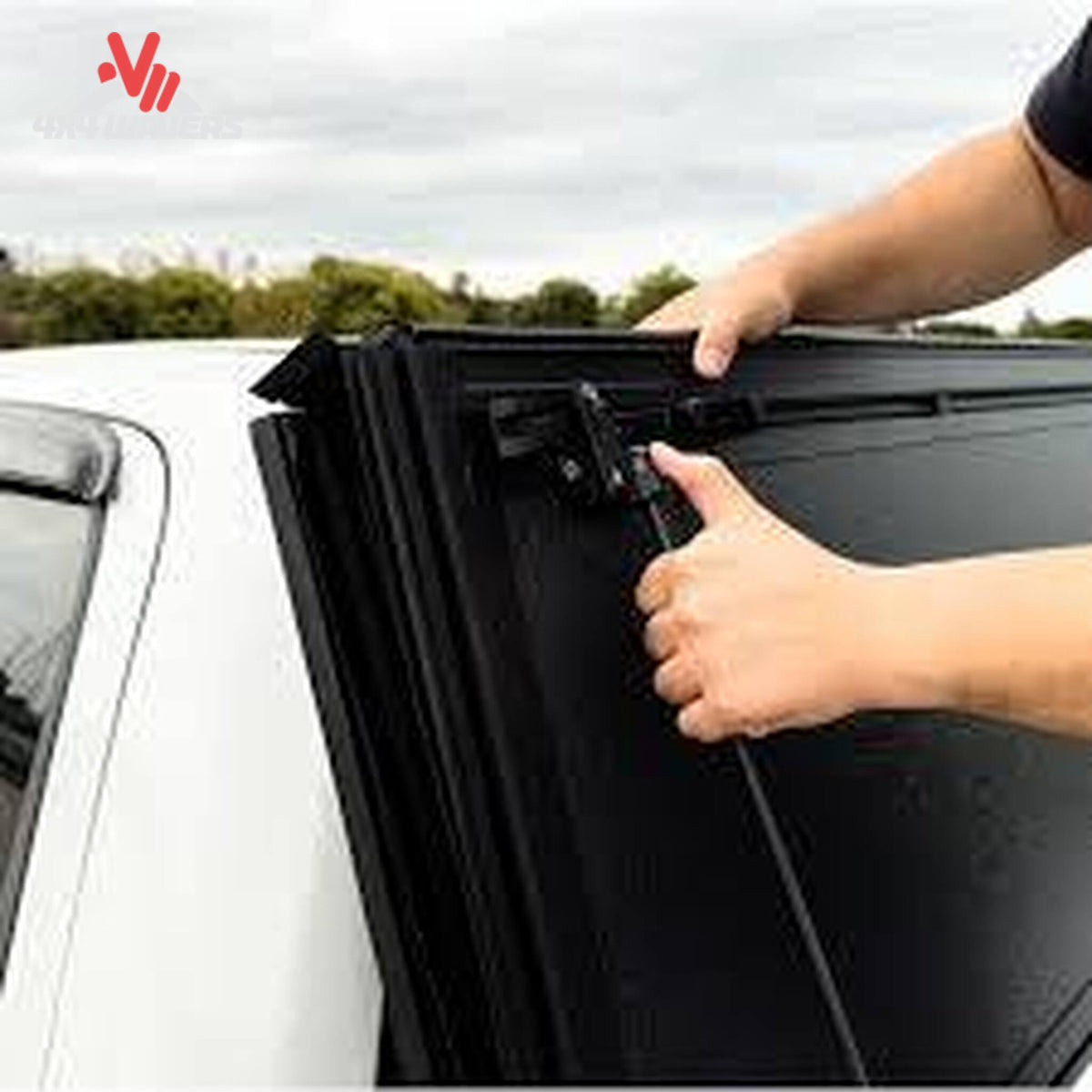 Close-up of Dura-Flip hard folding tonneau cover with quick-release clamps on a 2004-2014 Ford F150 5.5ft bed.