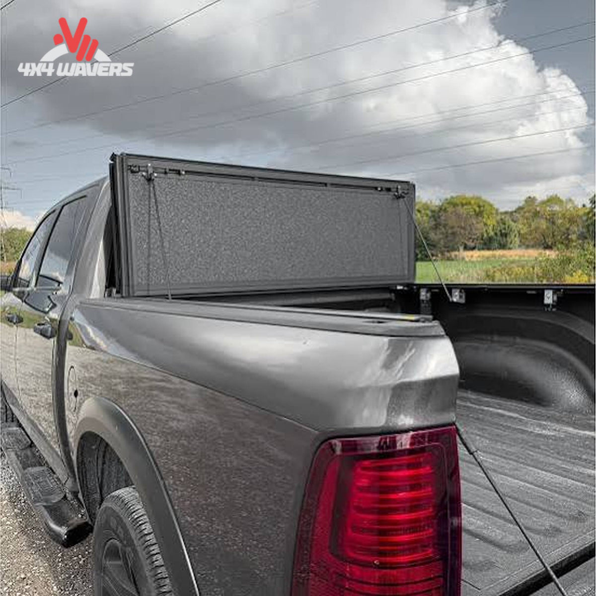 Dura-Flip hard folding tonneau cover with quick-release clamps on a Ford F150 bed, showing detailed clamp mechanism and sleek design.