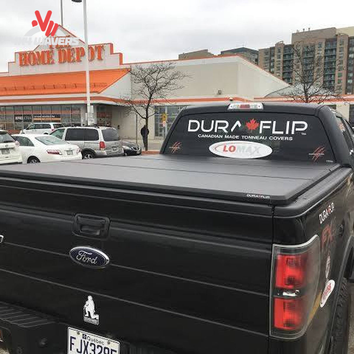 Dura-Flip hard folding tonneau cover installed on a 2004-2014 Ford F150 with 5.5ft bed, showing its sleek, secure design.