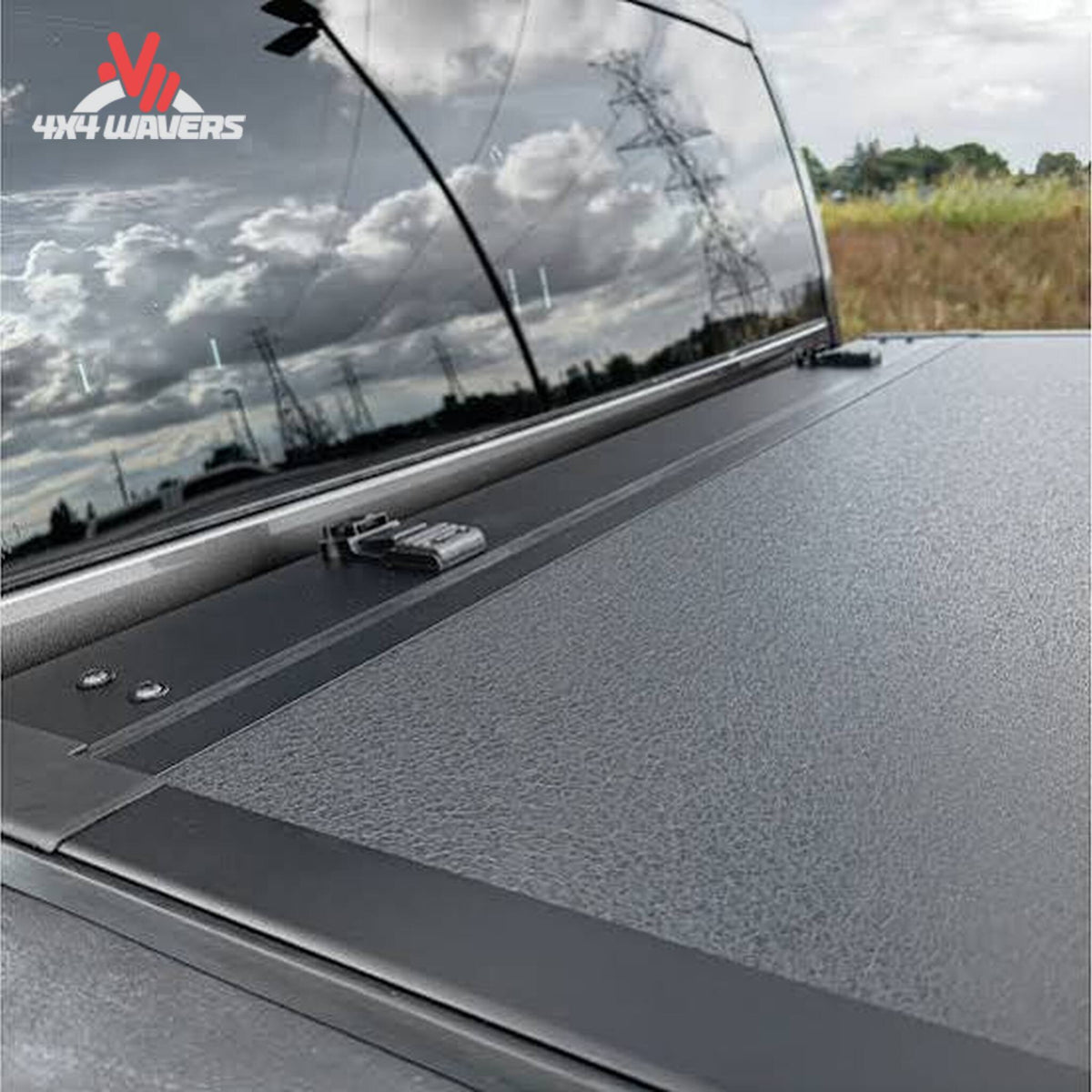 Dura-Flip hard folding tonneau cover installed on a 2004-2014 Ford F150 with a 6.5ft bed, showing its sleek, durable design.