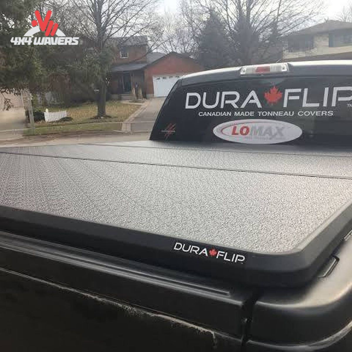 Dura-Flip hard folding tonneau cover installed on a 2004-2014 Ford F150 with a 6.5-foot bed, showing the covered truck bed.