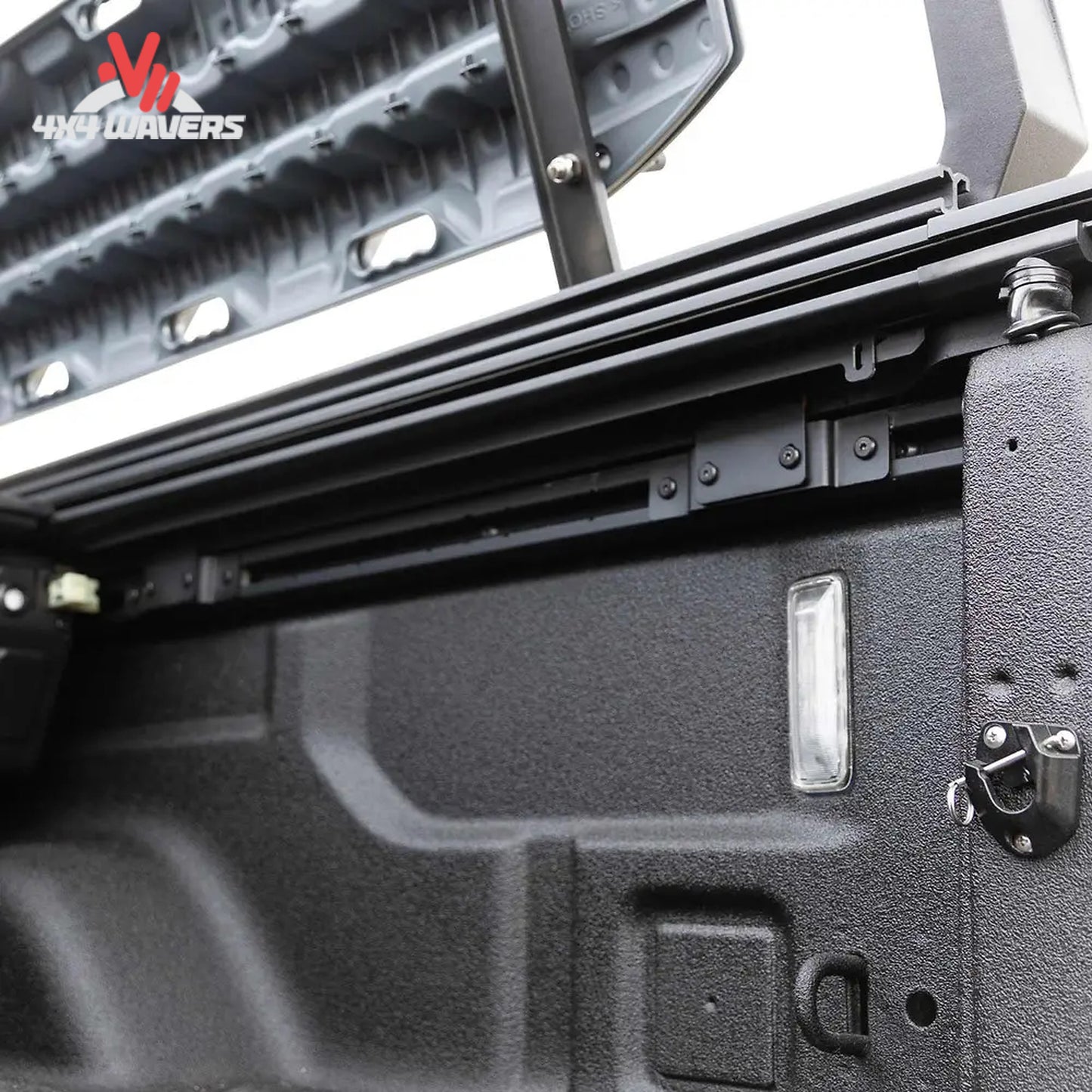Close-up of EGR RollTrac aluminum slat tonneau cover on a 2020–2026 Jeep Gladiator JT 5-foot bed, showing sleek design and locking mechanism.