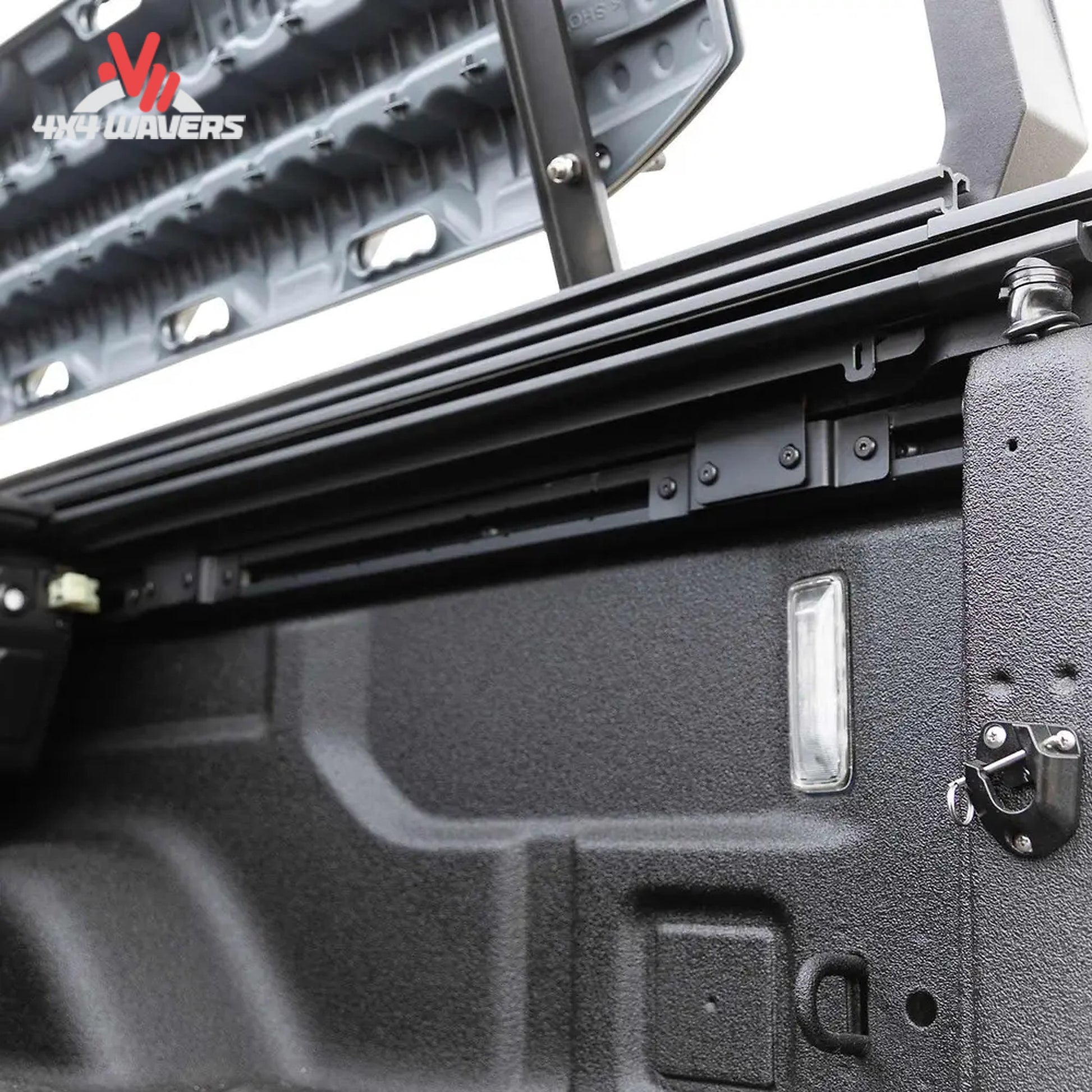 Close-up of EGR RollTrac aluminum slat tonneau cover on a 2020–2026 Jeep Gladiator JT 5-foot bed, showing sleek design and locking mechanism.