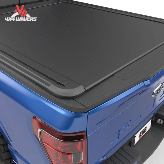 EGR RollTrac electric tonneau cover on 2015-2026 Ford F-150 with 6.5ft bed, sleek black truck bed cover with roller design.