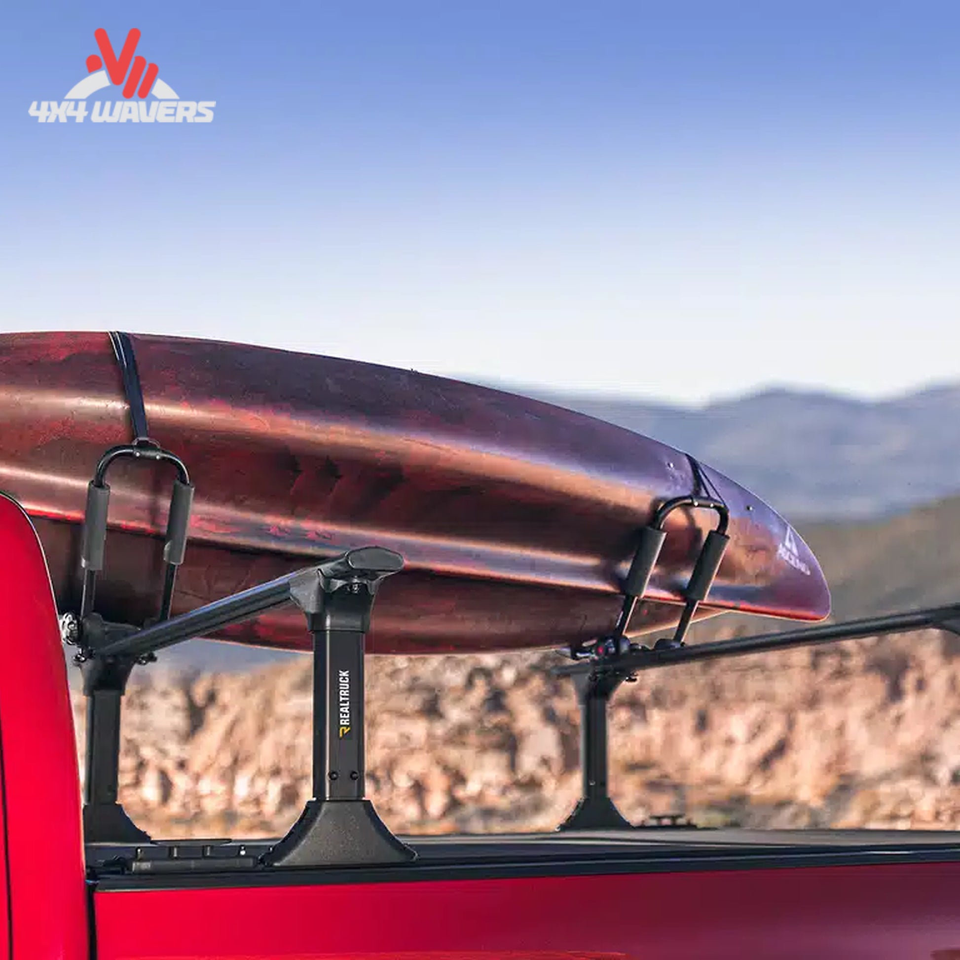 Kayak secured in RealTruck Elevate Kayak Carrier on truck rack