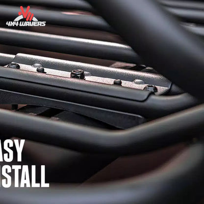 RealTruck Elevate cargo basket installed beside bike and kayak carriers on an adventure vehicle
