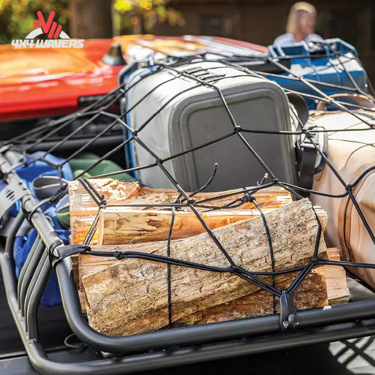 RealTruck cargo basket carrying camping equipment and recovery gear during an overland adventure