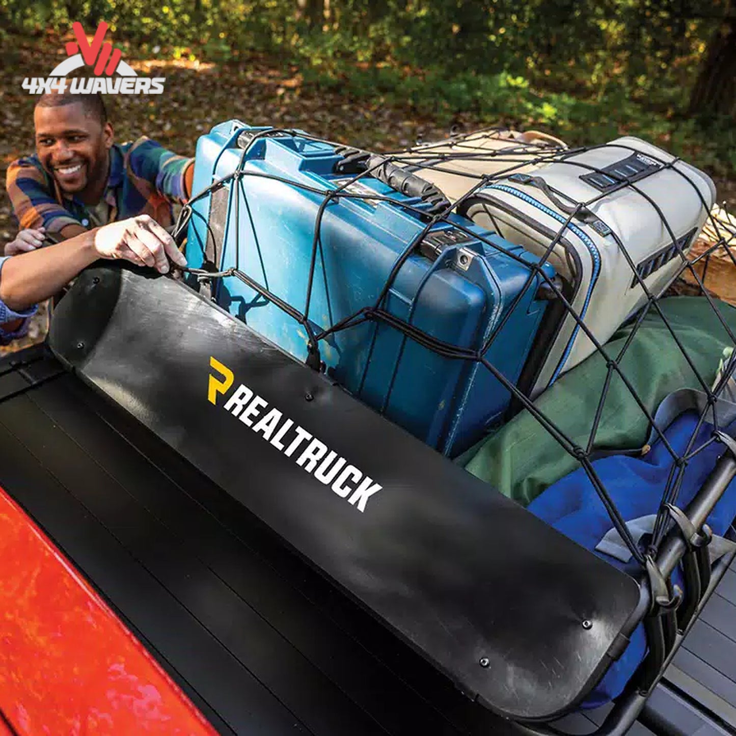 RealTruck cargo basket carrying camping equipment and recovery gear during an overland adventure